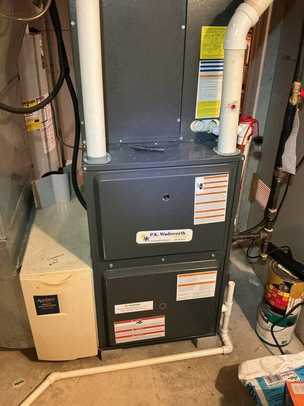 Completed routine cooling maintenance on residential HVAC system. Inspected furnace and air handler unit, verified proper operation of all components, and checked refrigerant levels. Replaced pleated air filter in side-mounted filter compartment to ensure optimal airflow and system efficiency for the upcoming cooling season.