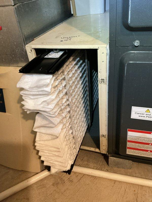 Completed routine cooling maintenance on residential HVAC system. Inspected furnace and air handler unit, verified proper operation of all components, and checked refrigerant levels. Replaced pleated air filter in side-mounted filter compartment to ensure optimal airflow and system efficiency for the upcoming cooling season.