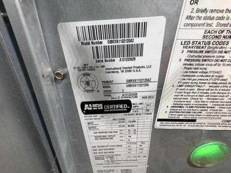 Responded to service call for AC suction line freezing issue. Inspected International Comfort Products furnace unit (Model G8MXN110212042, Serial A181223429) and associated ductwork system. Documented flexible metallic duct interior showing corrugated construction and equipment specifications for diagnostic reference. Freezing suction line typically indicates restricted airflow, low refrigerant charge, or improper system operation requiring further evaluation of evaporator coil, filter condition, and refrigerant levels to resolve the issue.