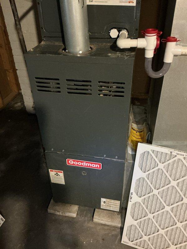 Completed comprehensive cooling system maintenance on residential HVAC system including Goodman furnace and outdoor condensing unit. Performed visual inspection of indoor air handler, verified proper condensate drainage system operation, confirmed air filter condition, and inspected electrical connections at outdoor unit including contactor, capacitor, and low-voltage wiring terminals. All components found operating within normal parameters with no immediate service needs identified.