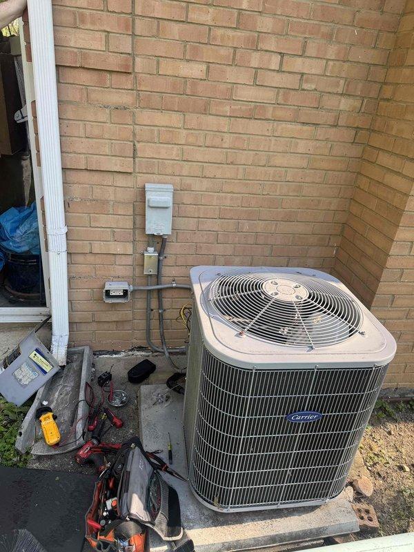 Responded to no cooling complaint on Carrier air conditioning system. Upon arrival, accessed outdoor condenser unit and inspected electrical components including capacitor, contactor, and associated wiring. Performed diagnostic testing with multimeter to identify failed component preventing system operation. Replaced defective dual run capacitor and verified proper electrical connections. Cycled system to confirm compressor and condenser fan motor operation restored, with unit now cooling normally.