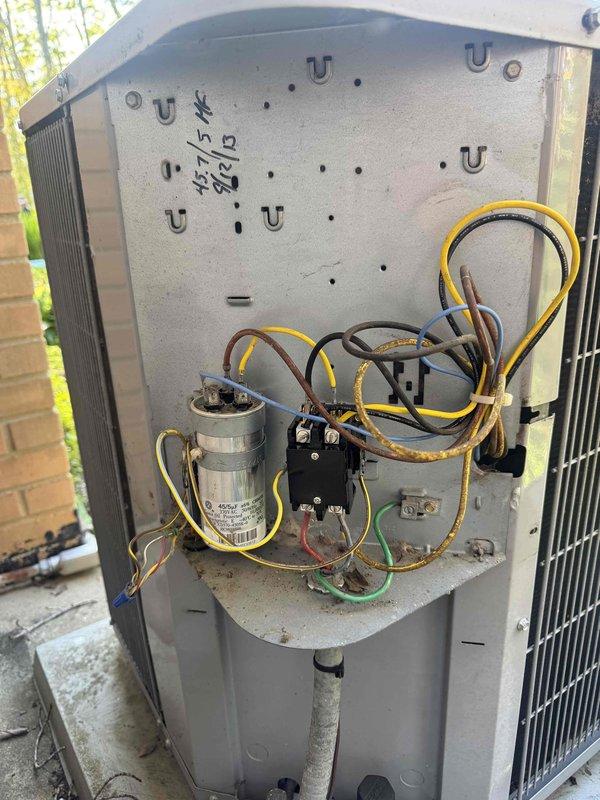 Responded to no cooling complaint on Carrier air conditioning system. Upon arrival, accessed outdoor condenser unit and inspected electrical components including capacitor, contactor, and associated wiring. Performed diagnostic testing with multimeter to identify failed component preventing system operation. Replaced defective dual run capacitor and verified proper electrical connections. Cycled system to confirm compressor and condenser fan motor operation restored, with unit now cooling normally.