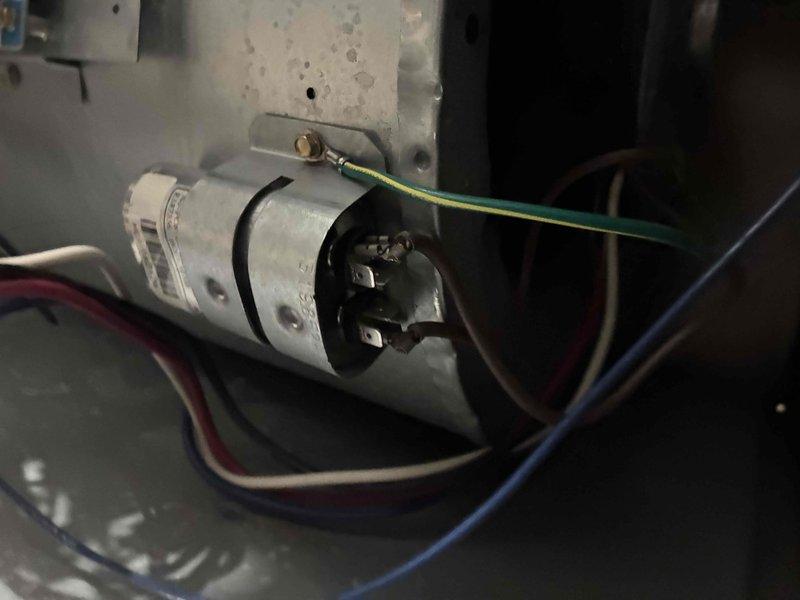 Completed comprehensive cooling system maintenance including inspection of electrical components and outdoor disconnect. Verified capacitor connections and secure mounting, checked all wire terminations for proper contact, and inspected exterior disconnect box for proper operation. System tested and confirmed operational.