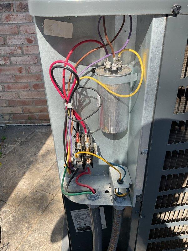 Performed comprehensive preventive maintenance on residential split-system HVAC cooling equipment. Inspected indoor furnace unit and outdoor condensing unit, verifying proper operation of all electrical components including capacitor, contactor, and control wiring connections. Confirmed gas furnace burner assembly condition, checked condensate drainage system, and documented equipment status through detailed photographic records. All systems tested and found operating within normal parameters with no deficiencies noted at time of service.