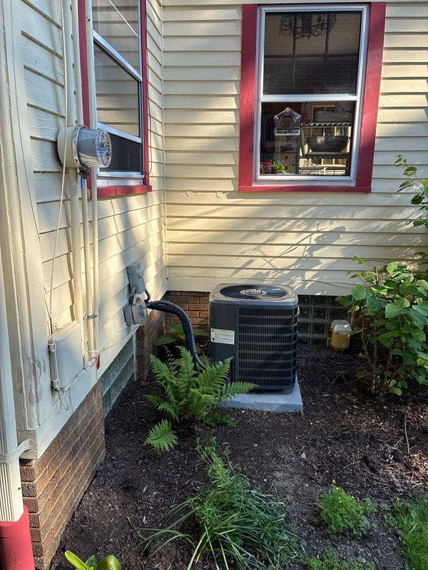 Conducted on-site evaluation for furnace replacement options at residential property. Documented existing HVAC system configuration including outdoor condensing unit installed on side of home with proper clearances and drainage. Assessed electrical service connections, metering equipment, and conduit routing for compatibility with potential new equipment installations. Photographed current system setup and surrounding access points to determine optimal replacement approach and equipment specifications. Provided homeowner with furnace replacement options based on existing infrastructure and system requirements.