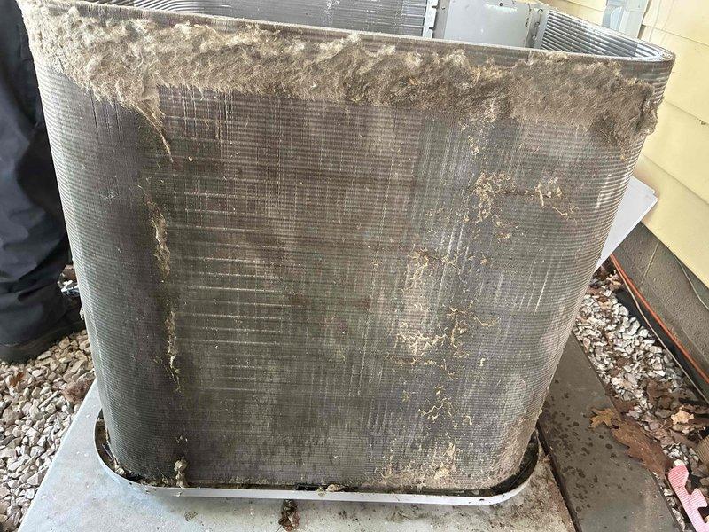 Performed comprehensive maintenance and repair on HVAC system experiencing reduced efficiency due to severe contamination. Disassembled and thoroughly cleaned blower wheel to restore proper airflow. Performed complete coil cleaning on heavily soiled condenser unit, removing extensive dirt, debris, and biological growth that had accumulated throughout the fin surfaces and was significantly impacting system performance. Replaced all 24-volt contactors and installed new run capacitor to ensure reliable electrical operation and proper compressor function.