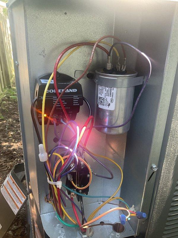 Performed seasonal startup and testing on recently installed Trane air conditioning system. Conducted comprehensive inspection of outdoor condenser unit, verified electrical connections within control panel, tested Copeland compressor module operation, and confirmed proper capacitor function. System energized successfully, all components operating within manufacturer specifications, and unit ready for cooling season use.