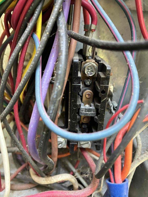 Completed preventive maintenance on cooling system including inspection of electrical components and control wiring. During inspection, identified significant rust and corrosion on electrical panel base plates and mounting hardware, along with aged wire insulation showing signs of degradation. Documented existing conditions of terminal blocks, junction points, and multi-circuit wiring connections for future reference and potential replacement recommendations.