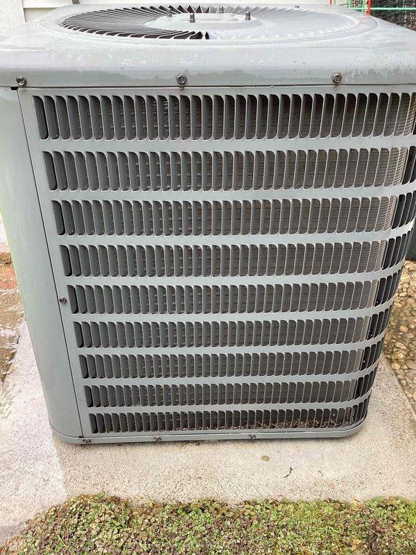 Completed scheduled HVAC maintenance on outdoor condensing unit. Performed standard inspection of condenser unit including visual assessment of cabinet condition, refrigerant line penetrations through building exterior, and overall system operation. Unit found to be in functional condition with normal weathering consistent with outdoor installation.