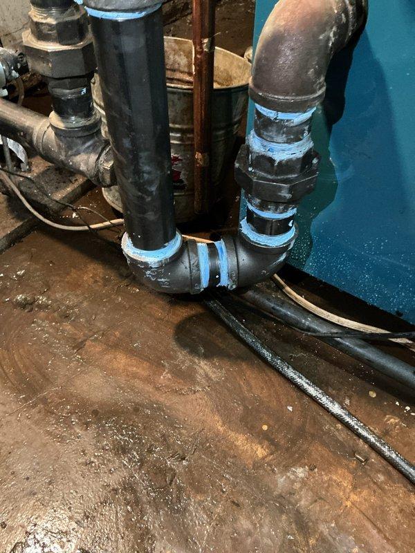 Returned to complete replacement of six cast iron pipe fittings in the mechanical room plumbing system. Successfully removed deteriorated cast iron elbow and connecting fittings showing significant age and corrosion, then installed new fittings to restore proper function and prevent future leaks. All connections tested and verified secure upon completion.