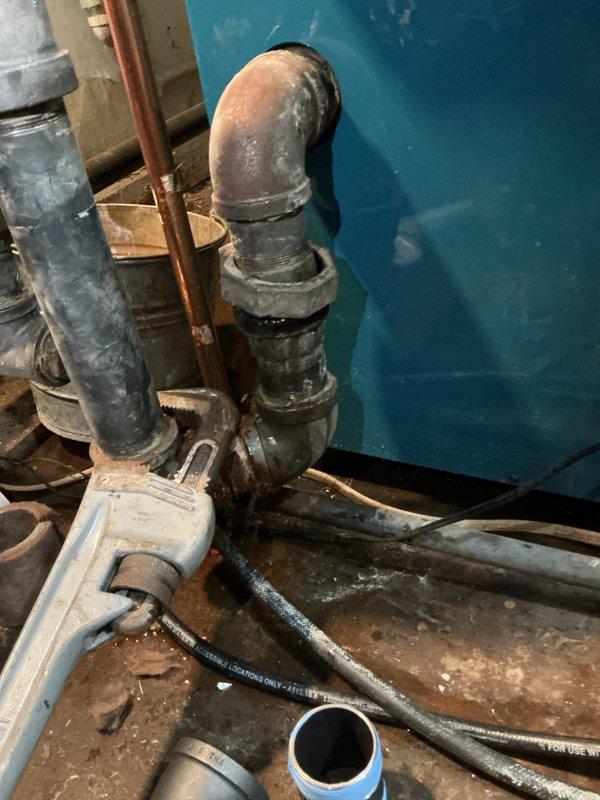 Returned to complete replacement of six cast iron pipe fittings in the mechanical room plumbing system. Successfully removed deteriorated cast iron elbow and connecting fittings showing significant age and corrosion, then installed new fittings to restore proper function and prevent future leaks. All connections tested and verified secure upon completion.