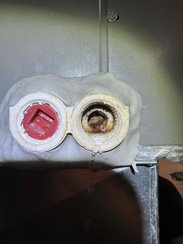Responded to service call for newly installed HVAC system with reported ductwork damage and water leakage at furnace base. Upon inspection, identified compromised duct connections and confirmed active condensate leak from air conditioning coil draining improperly at furnace unit. Repaired damaged ductwork sections, secured all connections with proper sealing, and addressed drainage issue to prevent further water accumulation.