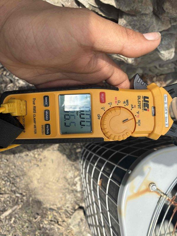 Responded to no cooling call on 15+ year old central air conditioning system. Upon arrival, found outdoor condensing unit failed to energize when thermostat called for cooling. Performed electrical diagnostics using clamp meter to test power supply and component functionality at the outdoor unit. Measured supply air temperature at ductwork, which registered 52.3°F, confirming lack of cooling operation. Tested thermostat signal, contactor operation, and compressor circuit. Determined system failure due to age-related component degradation on equipment beyond expected service life. Discussed repair versus replacement options with customer given unit age and condition. Documented electrical readings and temperature measurements for customer records.