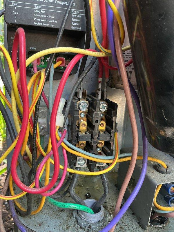 Responded to no cooling call where system would not power on. Upon arrival, inspected electrical components and contactor assembly. Found contactor with multiple wire connections showing signs of age, dust accumulation, and debris throughout the control panel area. Diagnosed electrical issue preventing system operation and collected service fee for diagnostic visit.