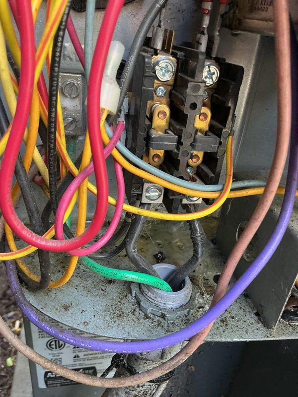 Responded to no cooling call where system would not power on. Upon arrival, inspected electrical components and contactor assembly. Found contactor with multiple wire connections showing signs of age, dust accumulation, and debris throughout the control panel area. Diagnosed electrical issue preventing system operation and collected service fee for diagnostic visit.