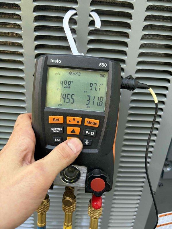 Completed installation of new air conditioning system. Installed ECNR30 Class RK5 dual-element time-delay fuses for electrical protection and verified proper system pressures and refrigerant charge using calibrated digital gauges, confirming R32 refrigerant operating within manufacturer specifications.