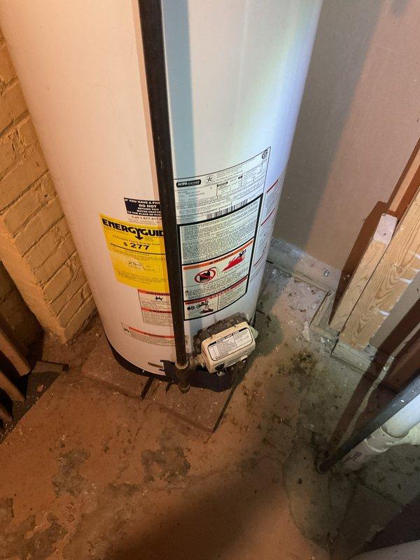 Responded to service call for Whirlpool tanked water heater experiencing excessive noise and reduced hot water capacity. Performed comprehensive inspection of unit, plumbing connections, valves, and venting system. Documented current condition of water heater installation, including all pipe connections, pressure relief valve, and insulation. Photographed unit specifications and manufacturer labels for service records.
