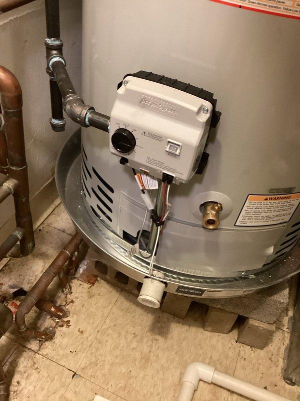 Responded to no hot water complaint on recently installed tanked water heater. Upon arrival, performed diagnostic inspection of new installation including all connections, valves, and control settings. Verified proper gas supply, water supply connections, and venting configuration. Inspected expansion tank mounting and pressure relief valve installation. Checked thermostat settings and pilot light operation. Adjusted temperature control dial to appropriate setting and confirmed ignition sequence. Tested hot water delivery at fixtures to verify system functionality. Ensured all copper piping connections were secure and leak-free. Confirmed proper clearances and code compliance for installation. System restored to full operational status with adequate hot water production throughout residence.