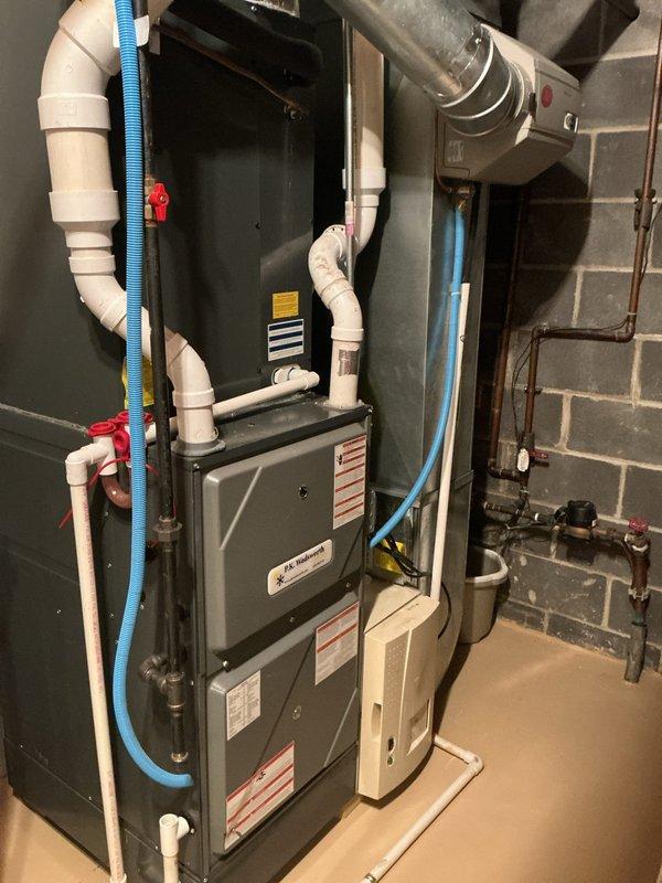 Completed comprehensive cooling system tune-ups on three HVAC units at the property, including one indoor air handler/furnace unit located in the basement mechanical room and two outdoor condenser units positioned on exterior gravel pad. Performed standard preventive maintenance procedures on all equipment, inspecting electrical connections, refrigerant lines, condensate drainage systems, and operational controls to ensure optimal system performance for the upcoming cooling season. Customer expressed interest in upgrading to WiFi-enabled thermostat systems for improved climate control and remote access capabilities.