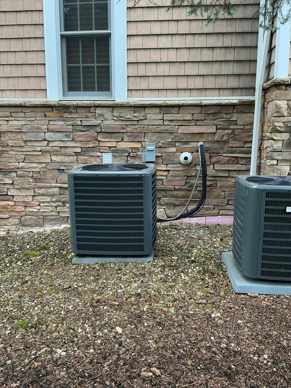 Completed comprehensive cooling system tune-ups on three HVAC units at the property, including one indoor air handler/furnace unit located in the basement mechanical room and two outdoor condenser units positioned on exterior gravel pad. Performed standard preventive maintenance procedures on all equipment, inspecting electrical connections, refrigerant lines, condensate drainage systems, and operational controls to ensure optimal system performance for the upcoming cooling season. Customer expressed interest in upgrading to WiFi-enabled thermostat systems for improved climate control and remote access capabilities.