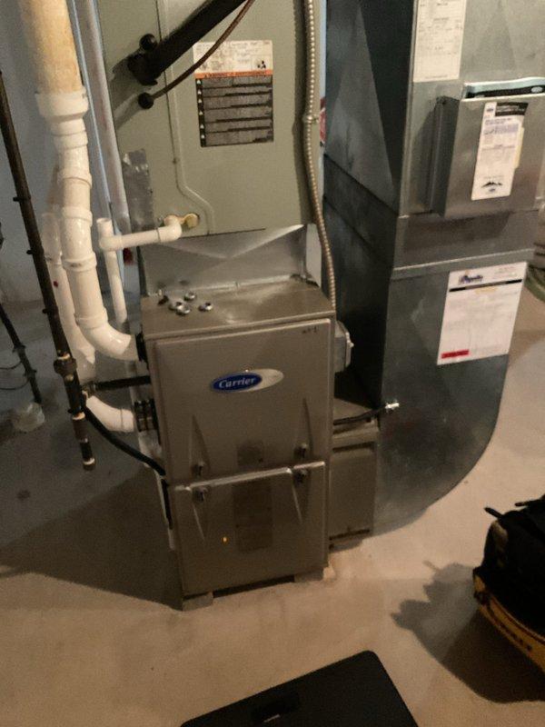 Completed heating maintenance on a 6-year-old Carrier furnace system. Performed standard maintenance procedures and identified the need for an Aprilaire 2410 media air cleaner to be installed on the system to improve indoor air quality and filtration efficiency.