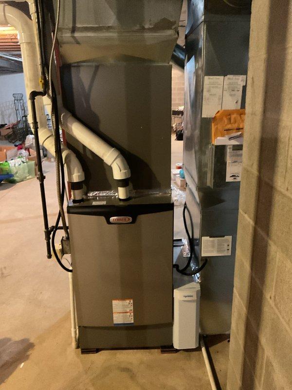 Completed heating maintenance on a 6-year-old Carrier furnace system. Performed standard maintenance procedures and identified the need for an Aprilaire 2410 media air cleaner to be installed on the system to improve indoor air quality and filtration efficiency.