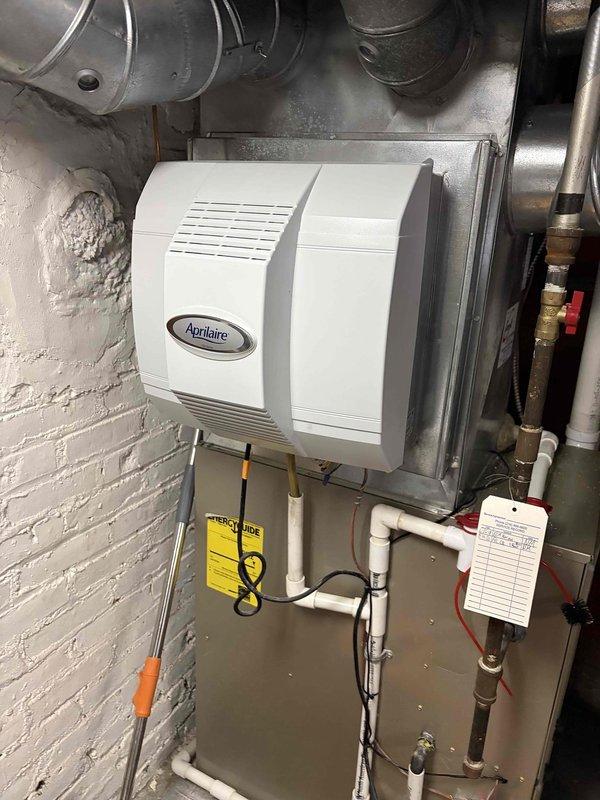 Completed comprehensive cooling system maintenance on residential HVAC unit. Performed thorough inspection of blower motor assembly, verifying proper electrical connections and control board functionality. Inspected Aprilaire humidifier system and associated plumbing connections to ensure optimal operation during cooling season. All components found to be operating within normal parameters with no immediate service needs identified.
