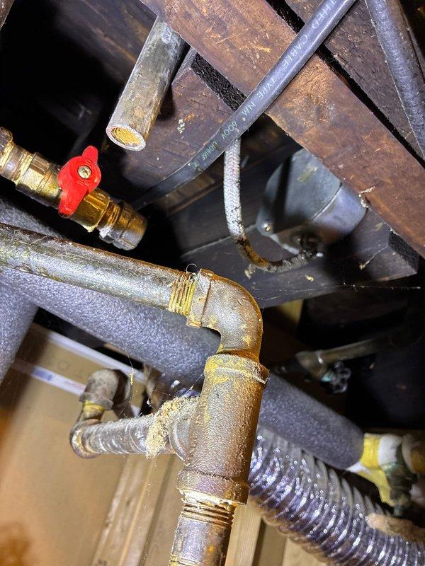 Conducted on-site assessment for non-functional 40-gallon gas water heater replacement. Inspected existing plumbing connections, gas supply lines with shut-off valve, and venting configuration in utility area. Documented current equipment condition and necessary replacement specifications for estimate preparation.