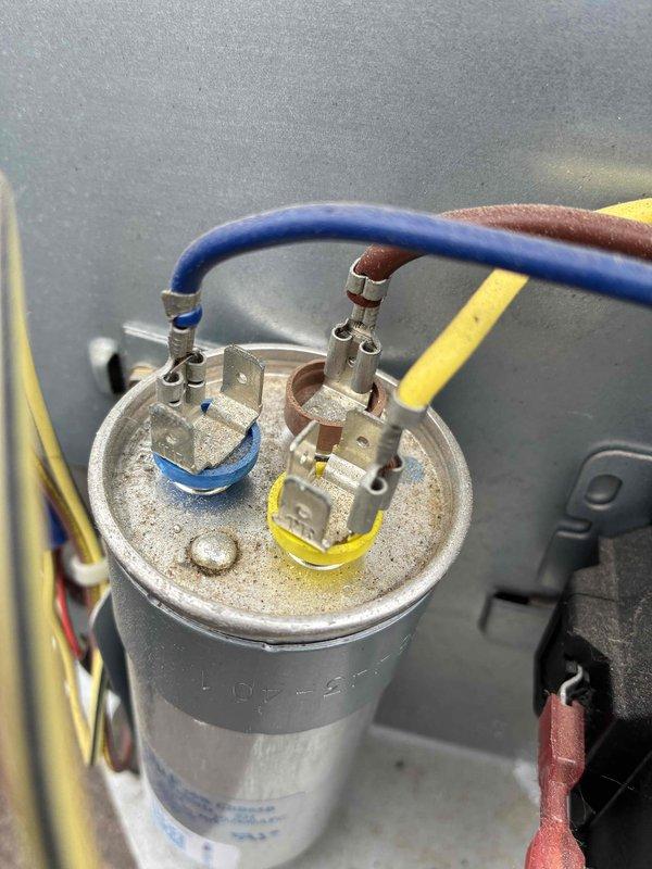 # HVAC Cooling Maintenance Completed

Performed comprehensive preventive maintenance service on Bryant brand air conditioning system as part of ongoing recurring maintenance program. Conducted thorough inspection of electrical components including capacitor, contactor, and associated wiring connections. Verified proper operation of dual-run capacitor with all terminal connections secure and functioning correctly. Inspected contactor relay for signs of wear, pitting, or degradation; confirmed proper electrical continuity and operation. Examined all wire connections including color-coded power and control wiring for tightness, corrosion, and proper routing. All electrical components found to be in good working condition with no immediate service needs identified. System operational and ready for cooling season.
