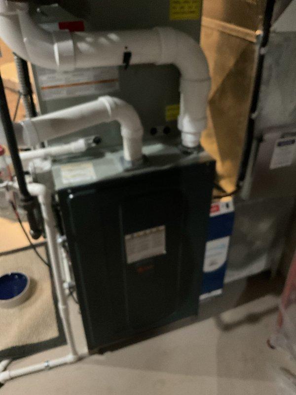 Completed scheduled cooling maintenance on dual HVAC system consisting of two Trane outdoor condensing units and indoor air handler components. Performed comprehensive inspection of both outdoor units including cleaning of condenser coils, verification of refrigerant levels, testing of compressor operation, and inspection of electrical connections and disconnect boxes. Inspected indoor furnace and air handler assembly, verified proper airflow through ductwork, and checked condensate drain lines for proper drainage. All system components were found to be operating within normal parameters, electrical connections were secure, and both units demonstrated proper cooling cycle operation upon completion of maintenance procedures.