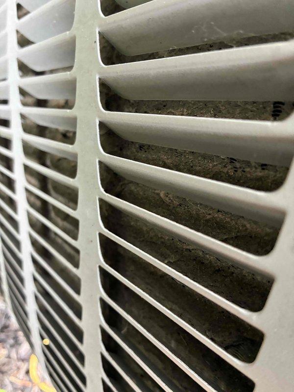 Completed scheduled preventative maintenance on residential cooling system. Upon inspection, condenser unit fins showed significant accumulation of dirt, dust, and debris restricting airflow. Thoroughly cleaned condenser coils and fins to restore optimal heat transfer efficiency and system performance.