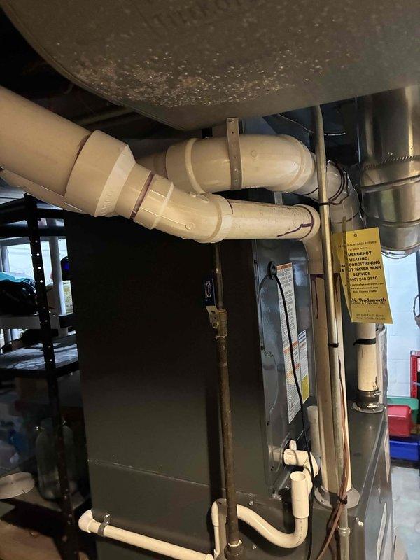 Completed comprehensive first-year cooling maintenance on residential HVAC system as part of maintenance plan. Performed thorough inspection of indoor air handler unit and associated ductwork in basement installation, verifying proper operation of all mechanical components and drainage systems. Conducted electrical diagnostics at outdoor condensing unit using digital clamp meter to measure amperage draw and verify system performance within manufacturer specifications. All equipment operating properly with no issues identified during routine maintenance visit.