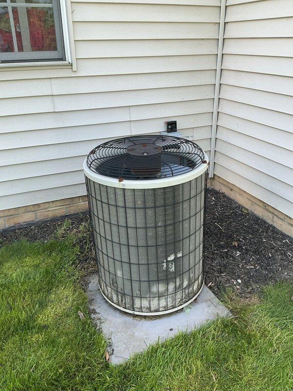 Responded to no-cooling call on residential air conditioning system. Upon arrival, confirmed condenser fan motor was operating normally but compressor failed to start. Diagnosed faulty compressor contactor preventing compressor operation. Replaced defective contactor, restored power, and verified system returned to normal cooling operation with compressor and fan motor running properly.