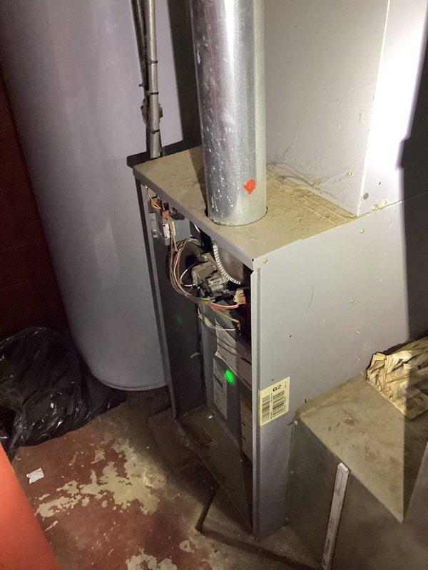 Completed routine HVAC cooling maintenance on residential split system. Inspected indoor furnace unit and outdoor condenser, verified all electrical connections at capacitor and contactor, checked refrigerant levels, cleaned condenser coils, and confirmed proper system operation with all components functioning within normal parameters.