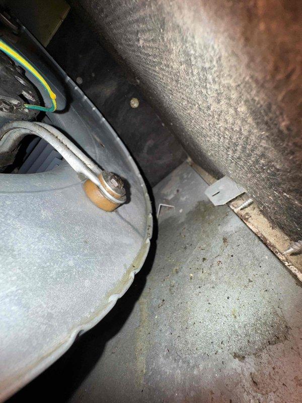 Responded to no heat or cooling complaint on system following recent fuse and contactor replacement. Upon inspection, diagnosed blower motor assembly and verified all electrical connections to motor including power and control wiring. Inspected HVAC unit components including blower wheel housing, motor mounting, and associated ductwork in confined mechanical space. System restored to proper operation with heating and cooling functionality confirmed.