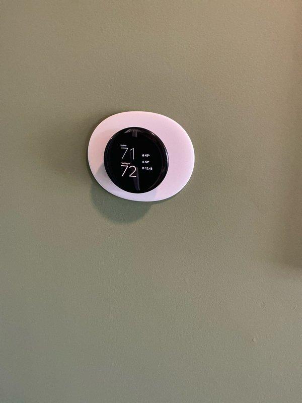 Conducted commercial rooftop unit assessment for hail damage on 11-12 ton RTU system. Documented extensive equipment damage from storm event for ongoing insurance claim, photographed thermostat and rooftop conditions, and provided repair estimate for damaged cooling equipment.