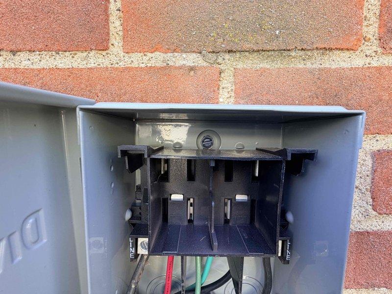 Responded to service call for furnace inspection preparation. Installed 30-amp Littelfuse in exterior fuse holder assembly to ensure proper electrical protection and code compliance for upcoming inspection.