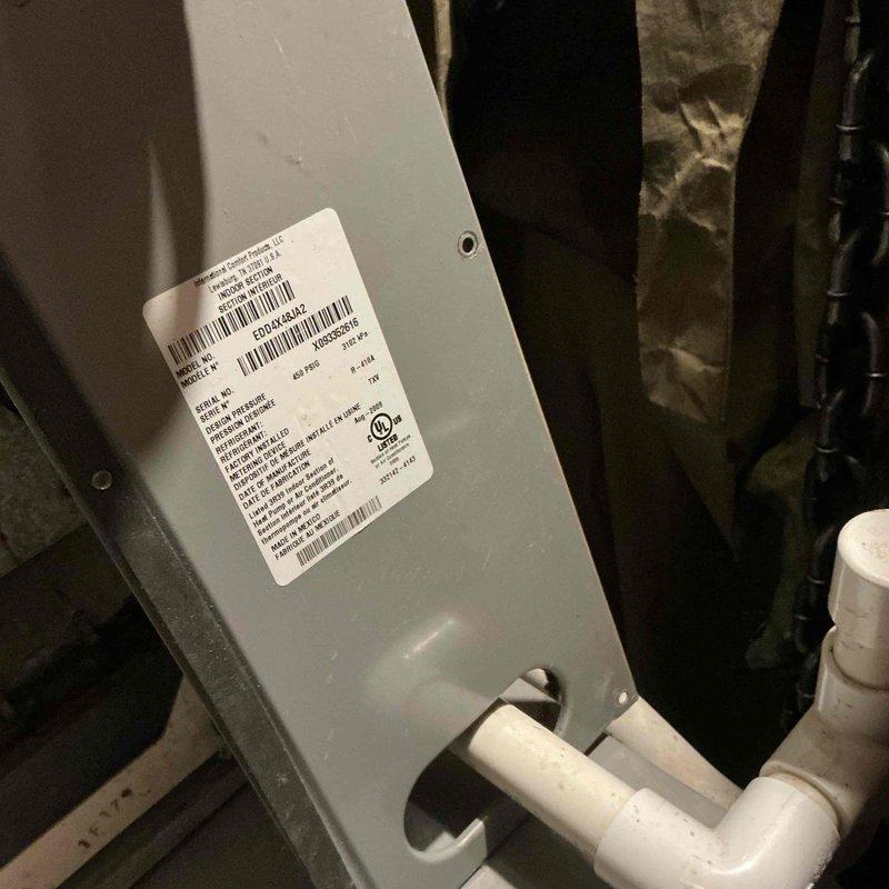 Conducted comprehensive HVAC system evaluation and provided detailed equipment replacement estimates for air conditioning system upgrade. Presented three tiered options for complete AC and evaporator coil replacement featuring Goodman equipment with efficiency ratings ranging from 13.4 to 16 nominal SEER, allowing customer to select system based on performance preferences and energy efficiency goals. Documented existing equipment configuration including electrical panel, condensate drainage system, and ductwork components in mechanical space to ensure accurate sizing and compatibility for proposed replacement units.