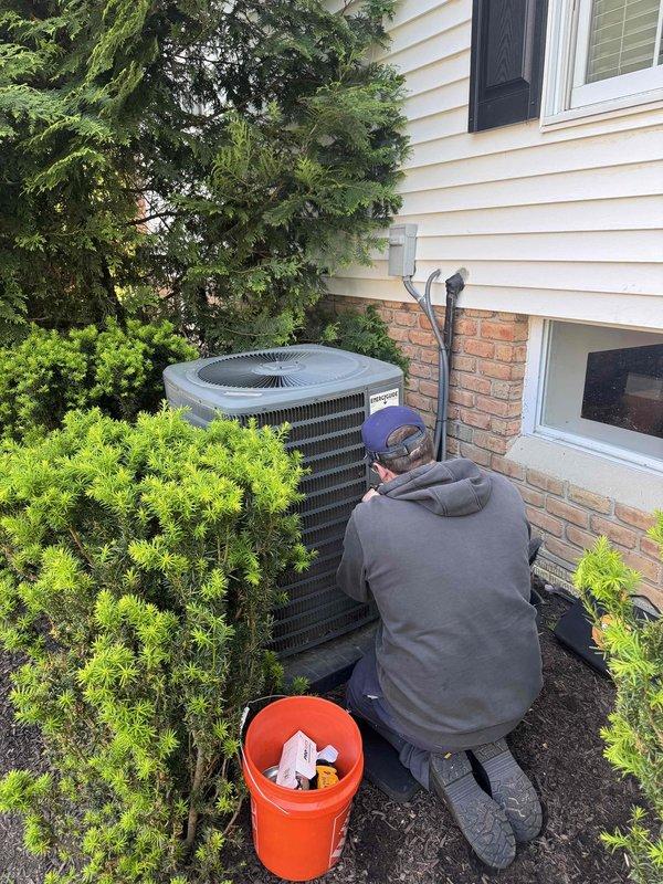 Responded to no cooling complaint on residential air conditioning system. Performed electrical diagnostics on outdoor condensing unit using digital clamp meter and test leads to measure voltage and current readings. Unit evaluated and serviced to restore proper cooling operation.