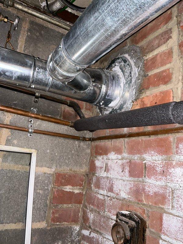 Responded to no cooling complaint and performed system evaluation. Assessed outdoor condensing unit location and indoor ductwork system with flexible supply trunk showing moisture accumulation. Provided customer with replacement options for complete HVAC system upgrade.