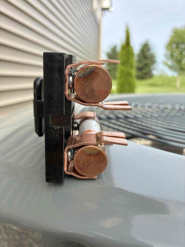 # HVAC Cooling Maintenance Summary

Completed scheduled preventive maintenance on residential Trane cooling system. Performed comprehensive inspection of indoor furnace unit and outdoor condensing unit, verifying proper operation of all components. Examined electrical connections at outdoor unit, noting oxidation present on copper terminals which is consistent with normal outdoor exposure. Checked refrigerant lines, condensate drainage, and all mechanical connections. System operating within manufacturer specifications with no immediate service needs identified.