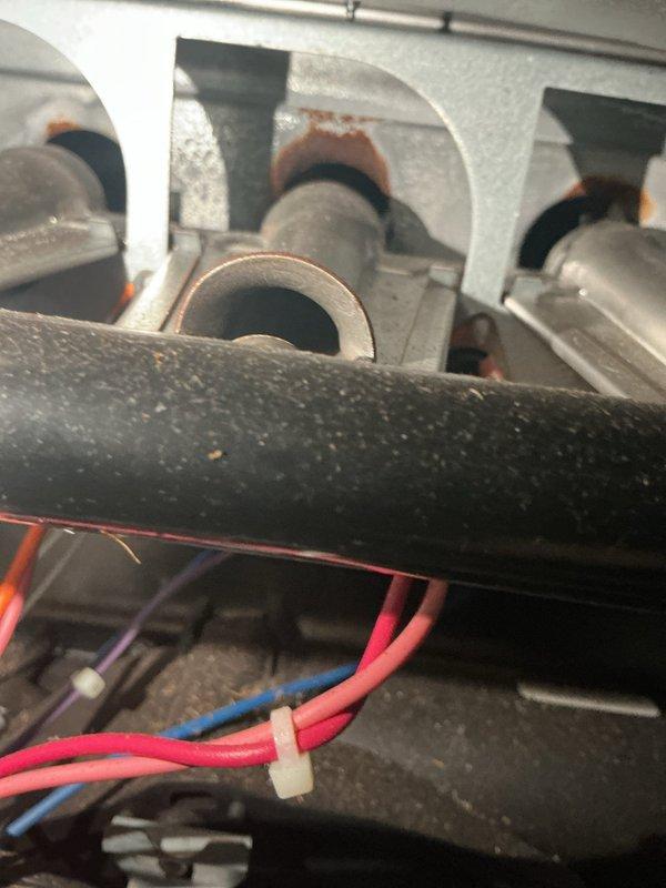 Completed scheduled preventive cooling maintenance on HVAC system. Performed comprehensive inspection of interior mechanical components, including motor assembly, burner compartment, and electrical connections. Assessed ductwork condition and verified proper airflow through flexible duct sections. All components found operational with normal wear patterns, system ready for continued cooling season operation.