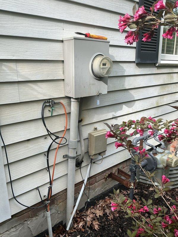 Completed comprehensive whole home electrical inspection covering all accessible areas including exterior service entrance, meter base, main disconnect, interior panels, and attic electrical systems. Documented existing electrical infrastructure with photographic evidence showing exterior meter installation with PVC conduit routing and interior attic space containing electrical wiring, junction boxes, and integration points with HVAC ductwork. All major electrical components were visually assessed for code compliance, proper installation methods, and overall system condition.