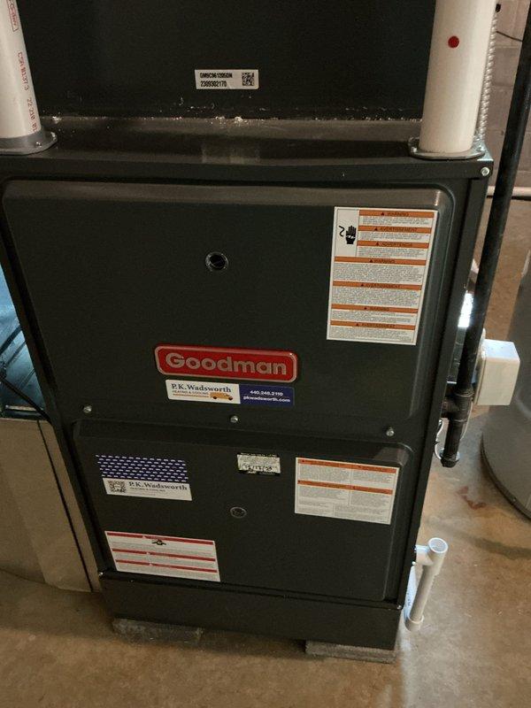 # HVAC Cooling Maintenance Summary

Completed scheduled preventive maintenance on residential cooling system with Goodman furnace unit. Performed comprehensive system diagnostics using digital manifold gauges, recording operating temperatures and pressures to verify proper refrigerant charge and system performance. All measurements indicated normal operating parameters with appropriate superheat and subcooling values. System operating efficiently with no deficiencies noted.

# Detailed Service Description

Performed routine cooling season maintenance on residential HVAC system. Upon arrival, conducted visual inspection of Goodman furnace unit and associated components in basement mechanical room. Verified all manufacturer labels, specifications, and safety warnings were intact and legible on equipment.

Connected Fieldpiece digital manifold gauge set to system service ports to evaluate refrigerant circuit performance. Monitored and recorded multiple temperature readings across evaporat