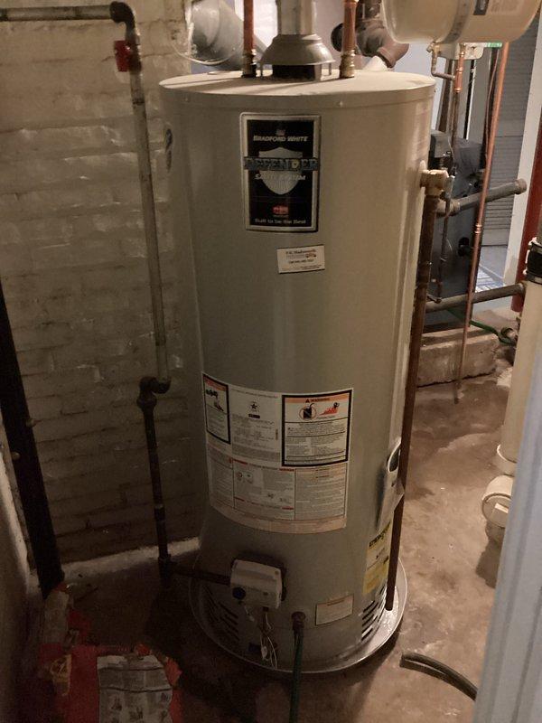 Performed routine maintenance flush and fill service on residential tanked water heater. Drained sediment buildup from tank bottom to improve heating efficiency and extend equipment lifespan. Refilled unit and verified proper operation of all connections, pressure relief valve, and venting system. All plumbing connections and components inspected and found to be functioning correctly upon completion.
