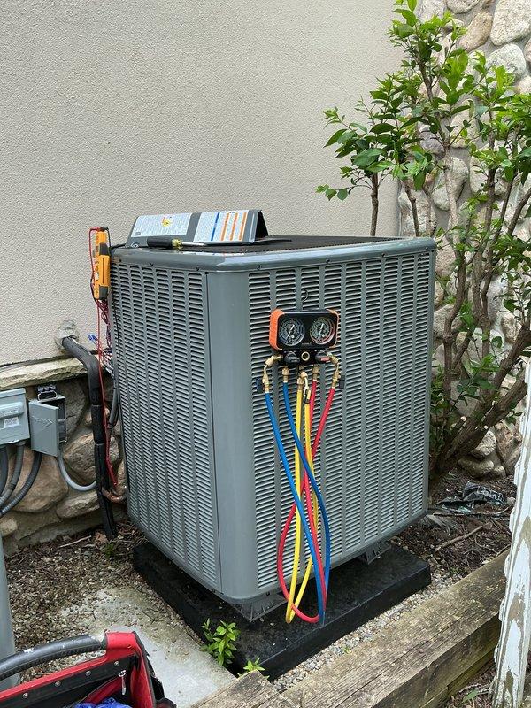 # HVAC No Cool Service Call

Responded to a no cooling complaint on a residential air conditioning system less than 10 years old. Upon arrival, connected manifold gauges to the outdoor condenser unit to assess refrigerant pressures and system performance. Performed diagnostic testing using calibrated instruments to measure airflow and temperature differentials at interior supply vents. Analysis revealed system operating parameters were outside normal specifications. Evaluated compressor operation, refrigerant charge levels, and airflow delivery to determine root cause of cooling failure. Restored system to proper cooling operation and verified adequate airflow at registers throughout the conditioned space.