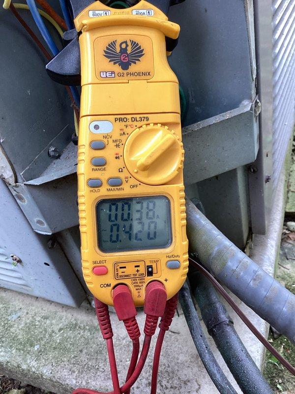 # HVAC Maintenance - Cooling System

Performed comprehensive preventive maintenance on residential air conditioning system. Conducted thorough inspection of outdoor condensing unit and indoor air handler components to ensure optimal system performance and reliability.

## Work Performed

Inspected outdoor condensing unit including compressor, condenser coil, and fan motor assembly. Verified proper refrigerant charge and system pressures. Checked electrical connections and measured voltage and amperage draw using clamp meter, confirming readings within manufacturer specifications at 30.98 volts. All electrical components operating within normal parameters.

Examined indoor air handler and evaporator coil assembly. Inspected condensate drain system including condensate pump with proper operation confirmed. Verified condensate pump functionality and drain line clearance. PVC drain piping connections secure with no signs of leakage or blockage.

Cleaned condenser coil surfaces to improve h