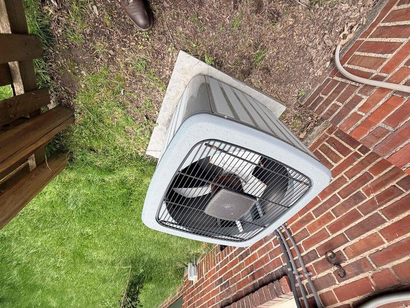Responded to no cooling complaint on residential split system air conditioning unit. Upon arrival, performed visual inspection of outdoor condenser unit and indoor air handler/furnace system. Condenser unit appeared in good physical condition with intact housing and protective grille. Verified refrigerant line set connections at exterior unit showed no obvious signs of damage or refrigerant leakage. Indoor equipment located in utility closet with adequate clearance and access. Documented system configuration with photographs for service records. Confirmed best contact information with customer for follow-up communication regarding diagnostic findings and repair recommendations.