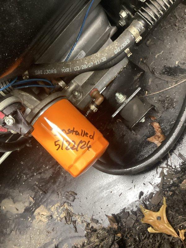 Performed scheduled generator maintenance including oil and filter change, battery service, and system inspection. Relocated exterior exhaust fan and associated electrical connections to new position on building exterior wall to improve ventilation efficiency and meet code requirements.