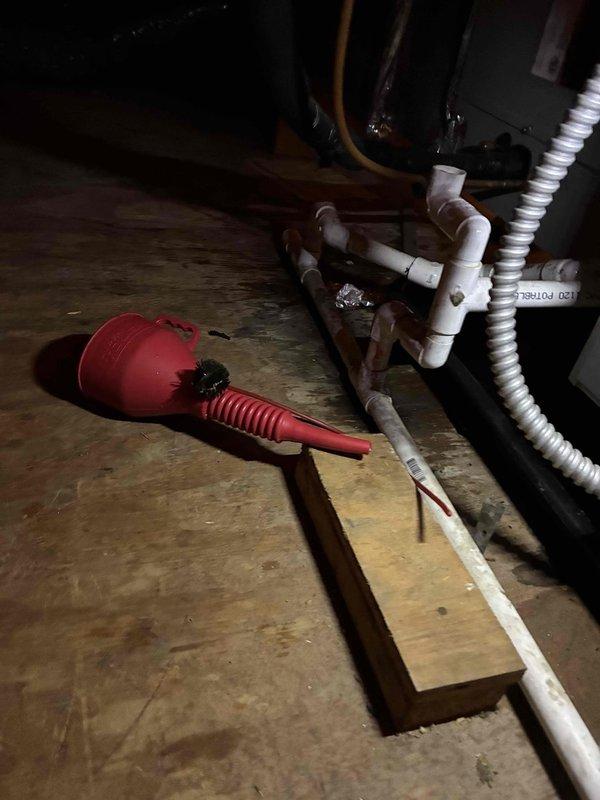 Responded to no-cool call on aging HVAC system where warm air from supply duct was causing condensation and water leakage at drain pan. Performed temperature diagnostics using digital thermometer, measuring supply air temperature at 4.75°F delta, indicating insufficient cooling capacity. Inspected attic-mounted air handler unit, drain lines, and associated PVC condensate piping for proper operation and drainage issues related to inadequate system performance.